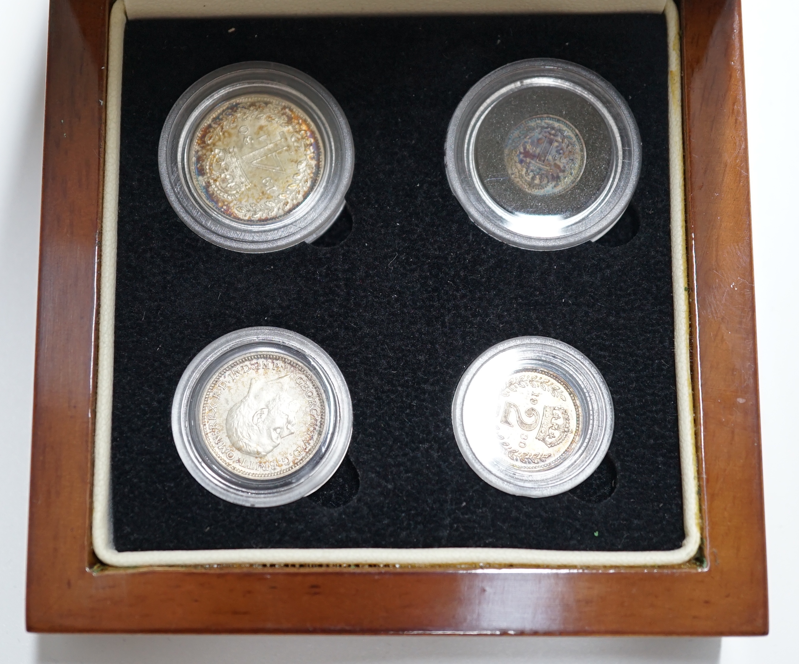 British silver coins, George V four coin set of Maundy coins, toned UNC, in London Mint case